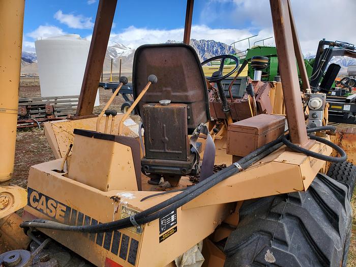 Used Case 580SE Backhoe w/ Attachments
