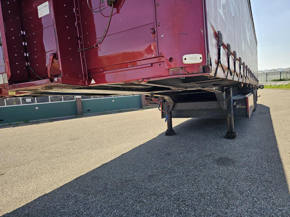 Used 2000 schmitz S01 | SLIDING ROOF | 2 LIFT AXLES| NICE HOLLAND TRAILER| SAF DISC.