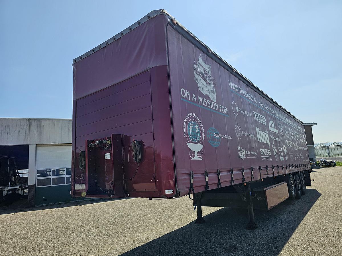 Used 2000 schmitz S01 | SLIDING ROOF | 2 LIFT AXLES| NICE HOLLAND TRAILER| SAF DISC.