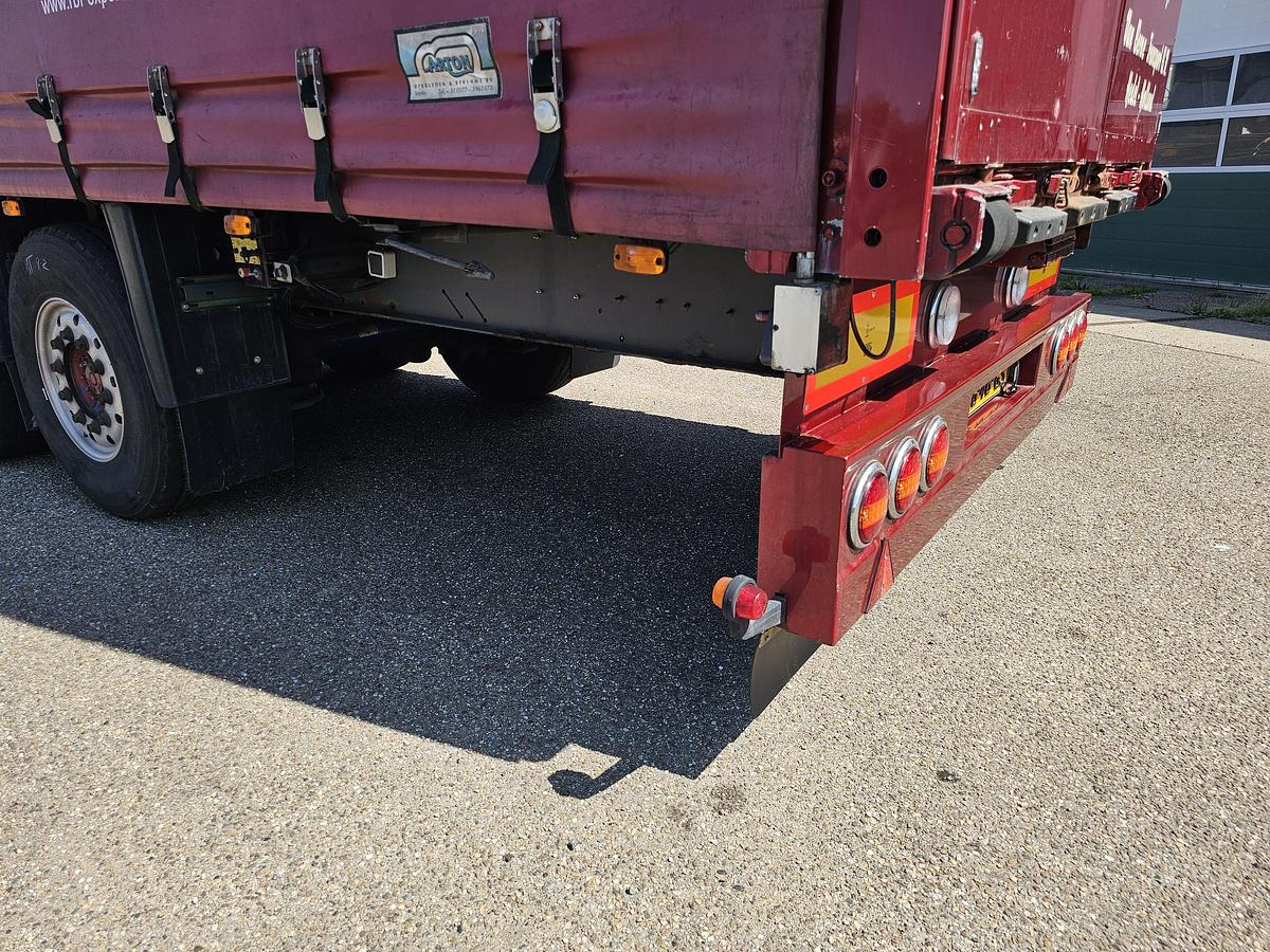 Used 2000 schmitz S01 | SLIDING ROOF | 2 LIFT AXLES| NICE HOLLAND TRAILER| SAF DISC.