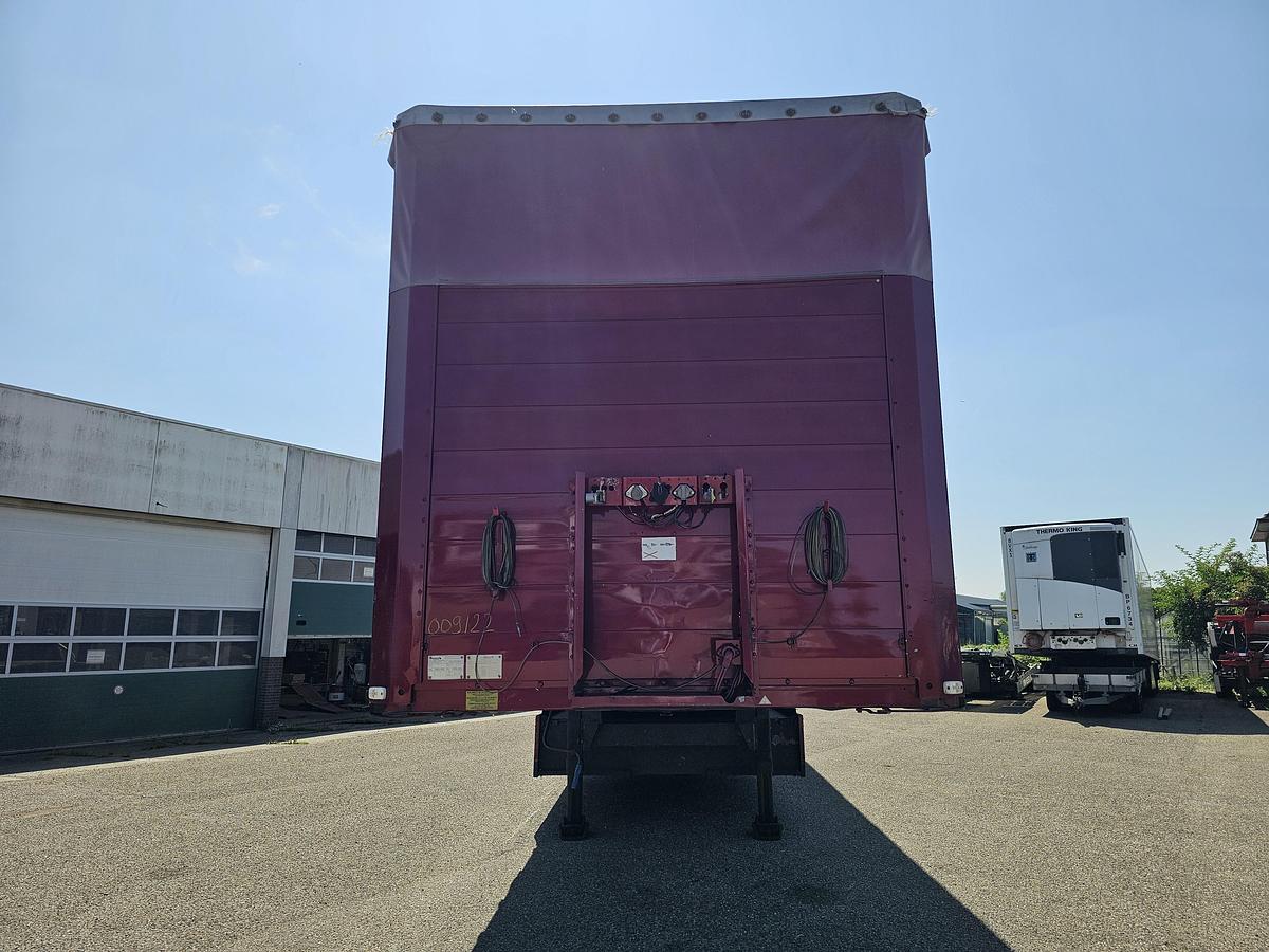 Used 2000 schmitz S01 | SLIDING ROOF | 2 LIFT AXLES| NICE HOLLAND TRAILER| SAF DISC.