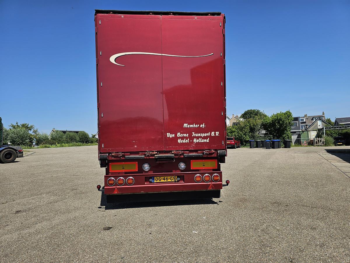 Used 2000 schmitz S01 | SLIDING ROOF | 2 LIFT AXLES| NICE HOLLAND TRAILER| SAF DISC.