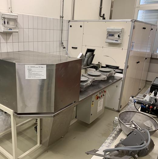 Used Hollow figure slingshot for truffle balls with 20 folding stations for foil sheets.