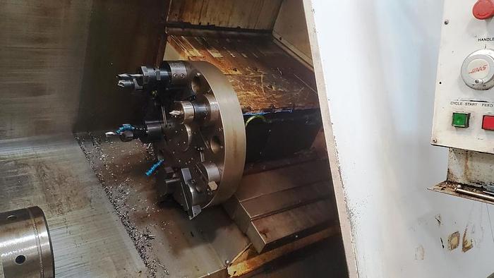 Used 1996 HAAS CCNC Lathe HL 4, 24" Swing, 9.5" Swing over slide, 30 HP, 3400 RPM, 3"  Bore, 12 Position Turret, HAAS CNC