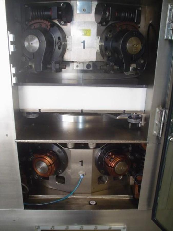 Used Used Kikusui 55 Station Gemini Double Sided Rotary Tablet Press.