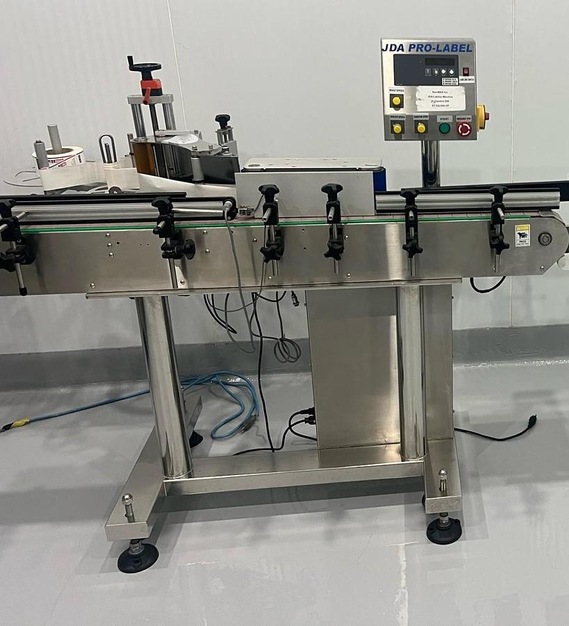 Used Used Pressure Sensitive Wraparound Bottle Labeler Model WLA-2