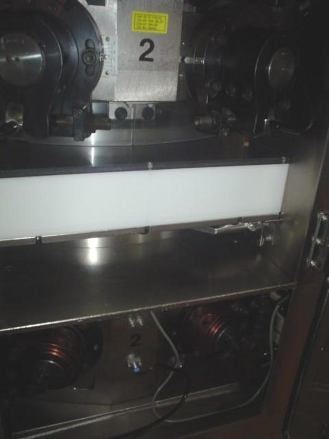 Used Used Kikusui 55 Station Gemini Double Sided Rotary Tablet Press.