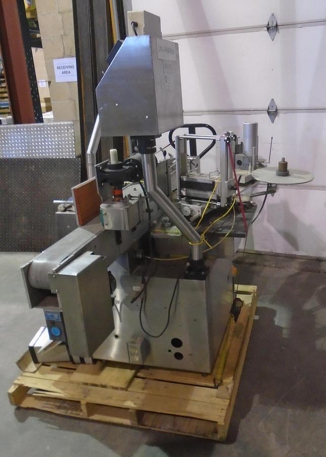 Used Used CLI Pressure Sensitive Wraparound Bottle Labeler Model UNI-300