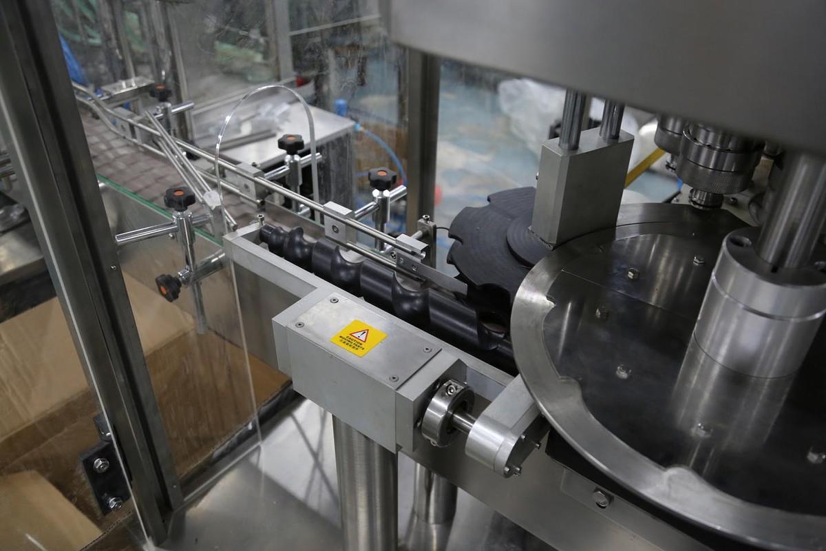 New High Speed Rotary Chuck Capper Model CP-400A