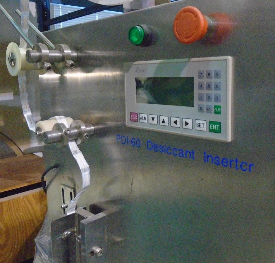 Used Used Desicant Inserter Model PDI-60