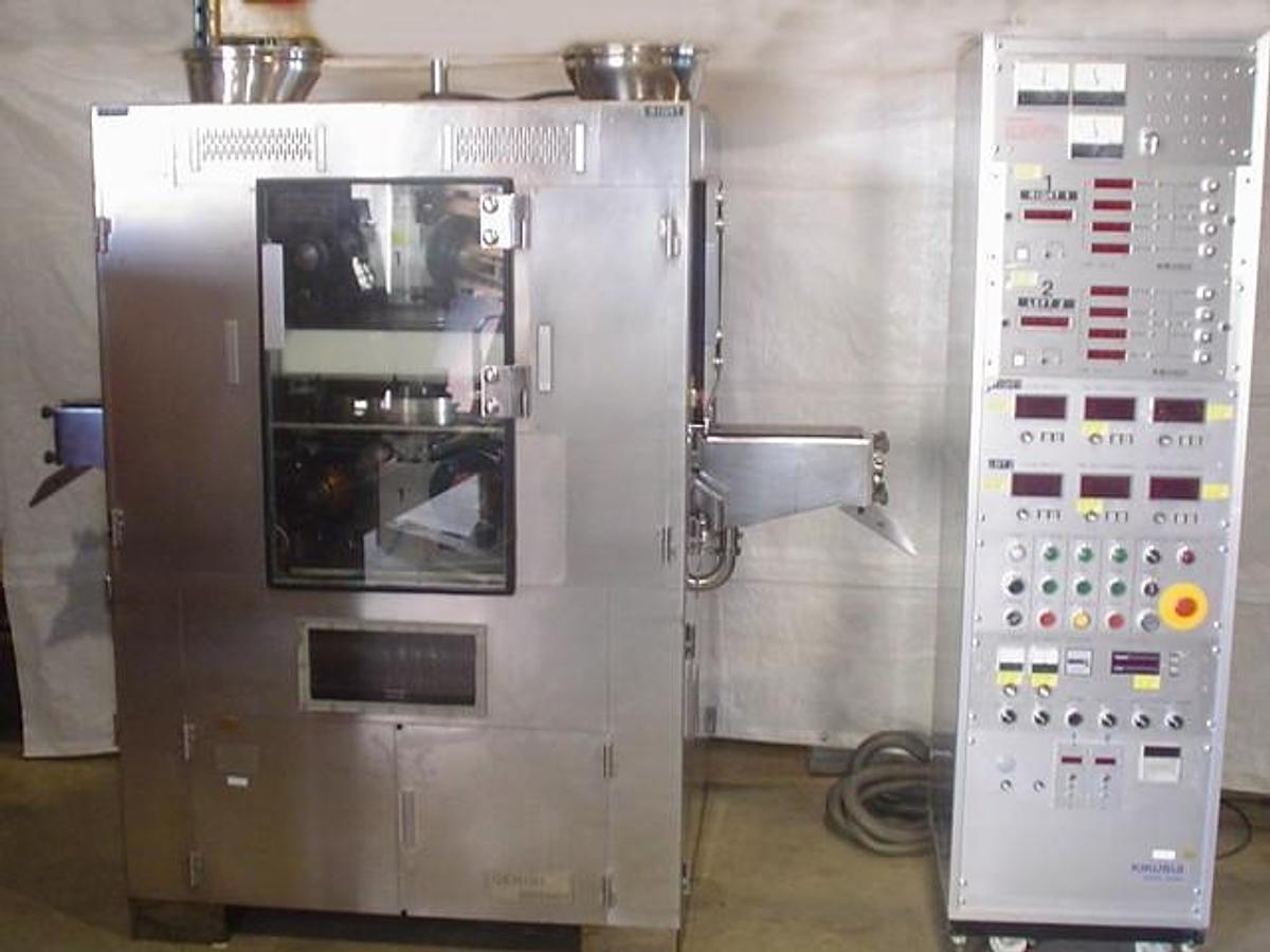 Used Used Kikusui 55 Station Gemini Double Sided Rotary Tablet Press.