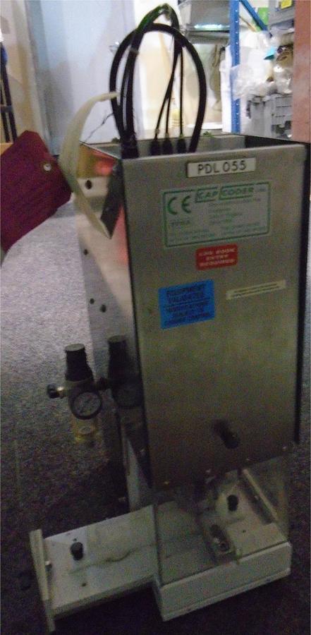 Used Used Bench top cap-tightener