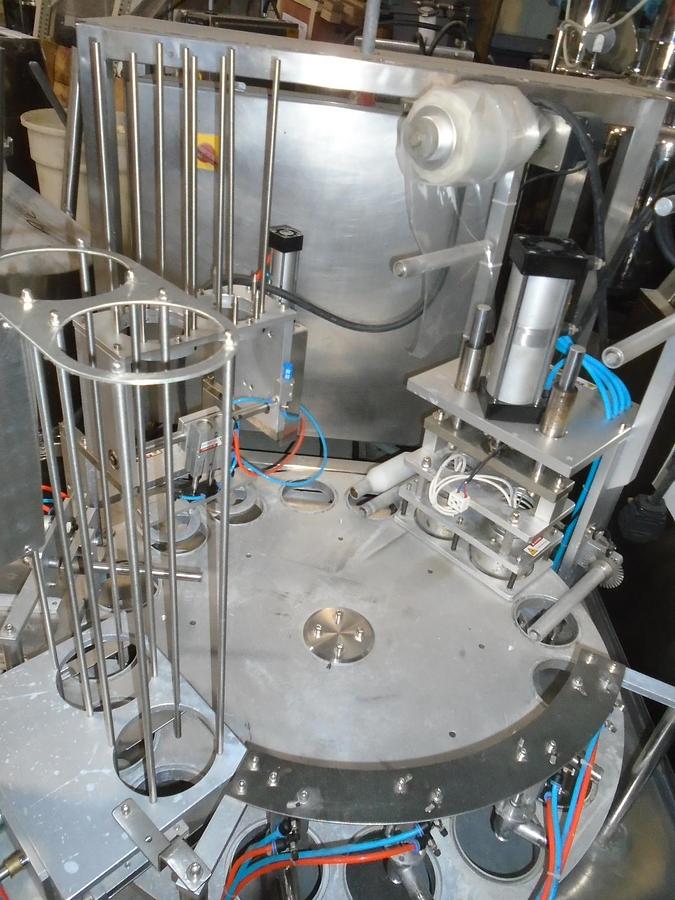 Used Bespacker 16 Rotary Cups Filler & Sealer Model XBG900-2
