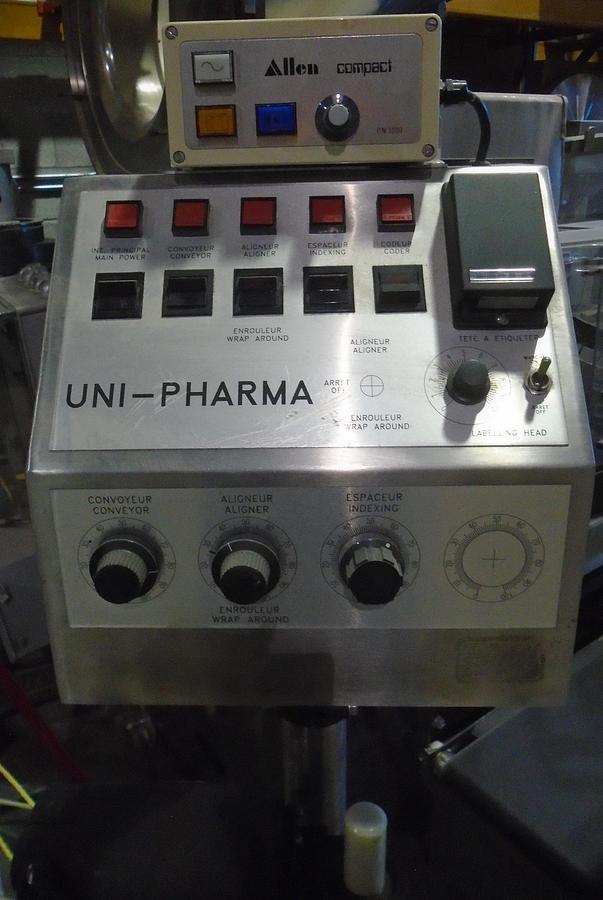 Used Used CLI Pressure Sensitive Wraparound Bottle Labeler Model UNI-300