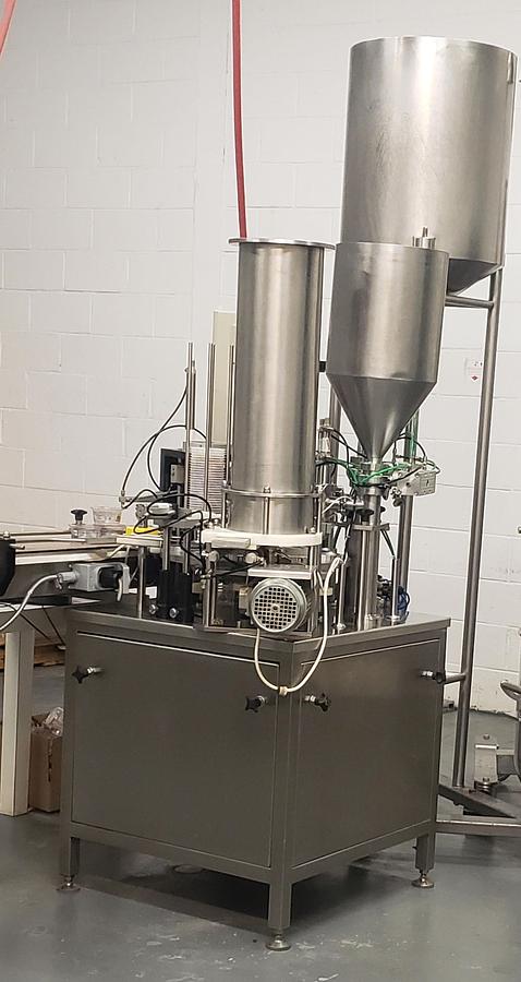 Used Used 9 Cup Rotary Filling Sealing Machine