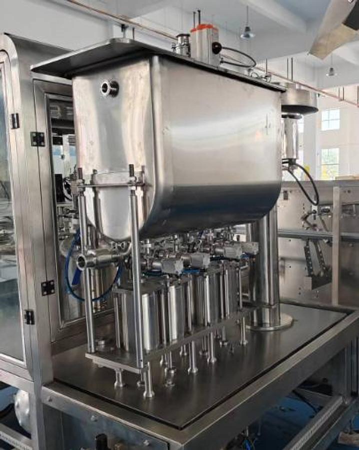 New Model XZ-4 Rotary Pre-Made Pouch Filling and Capping Machine