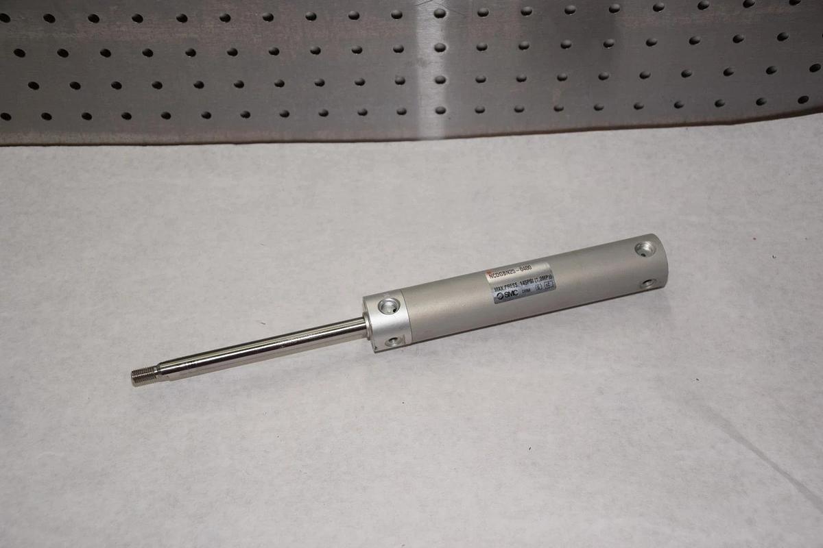 Used SMC NCDGBN25-0400 145psi 1.0MPa PNEUMATIC CYLINDER