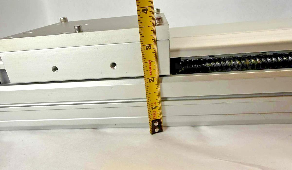 Used TOYO ETH Linear Actuator ETH14-L20-650-BC-T40-C4 ETH14 w/ Servo Motor 110v