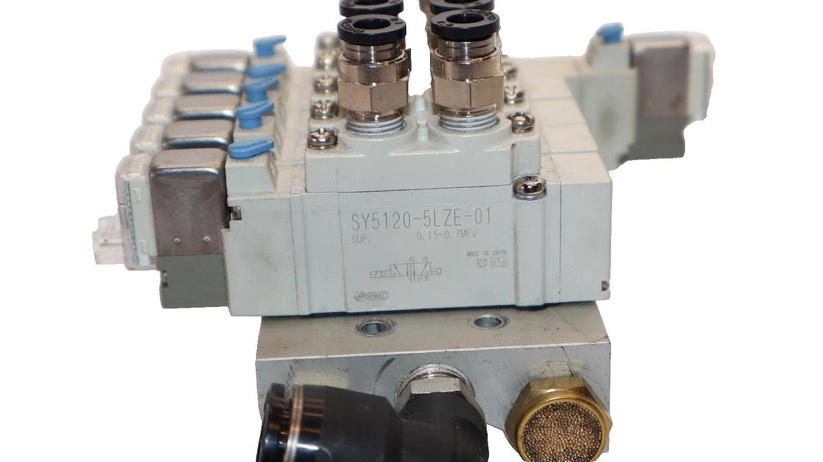 Used SMC Valve Block with (1) SY5420-5LZE-01 , (4) SY5120-5LZE-01 Solenoid Valve