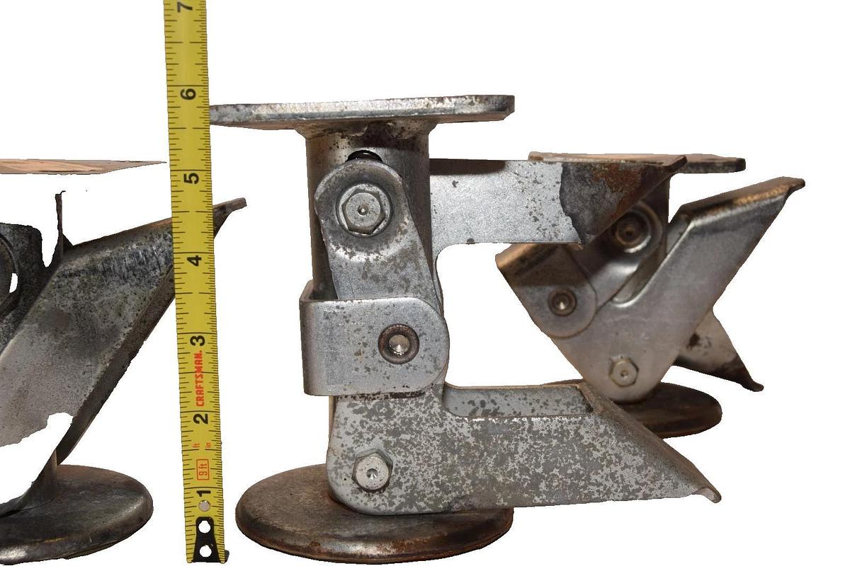 Used 2478T65  SB10988 5-3/8" - 5-5/8"  25/64" Floor Lock caster Kickbar  (Lot of 4)