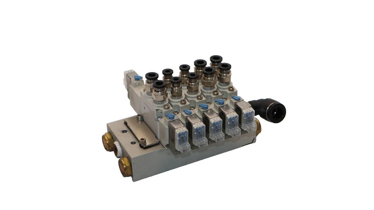 Used SMC Valve Block with (1) SY5420-5LZE-01 , (4) SY5120-5LZE-01 Solenoid Valve