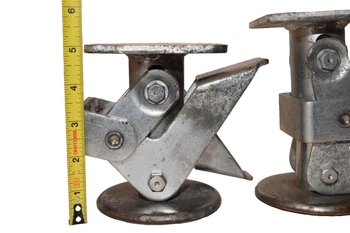 Used 2478T65  SB10988 5-3/8" - 5-5/8"  25/64" Floor Lock caster Kickbar  (Lot of 4)