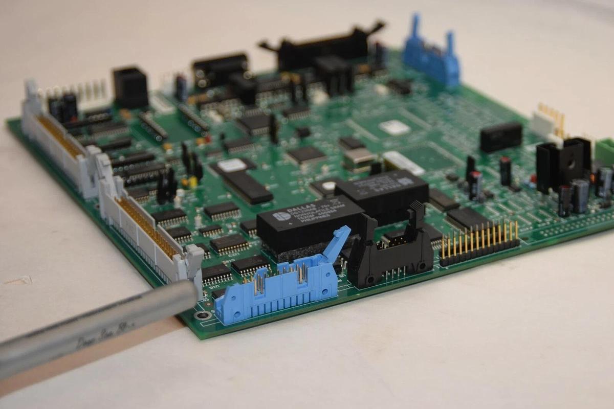 Used EMERSON / LIEBERT 02-797490-01 Rev 12 Circuit Board *Chipped Locking Tab*