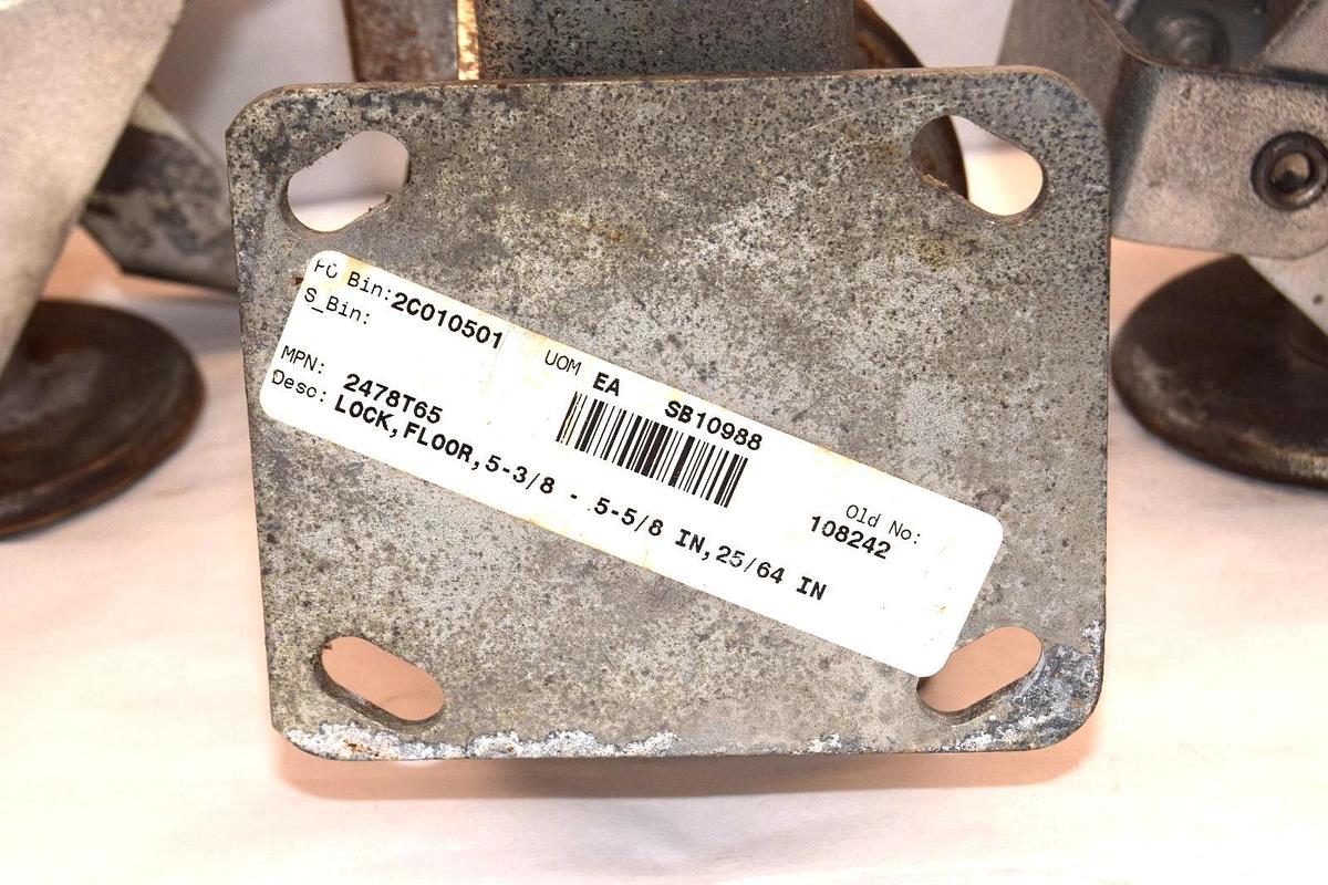 Used 2478T65  SB10988 5-3/8" - 5-5/8"  25/64" Floor Lock caster Kickbar  (Lot of 4)