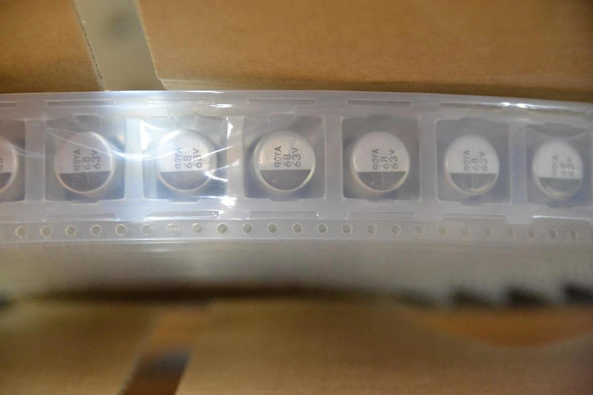 NIPPON CHEMI-CON EMVA630ADA680MJA0G CAPACITOR LOT OF approx 700 (2 reels)