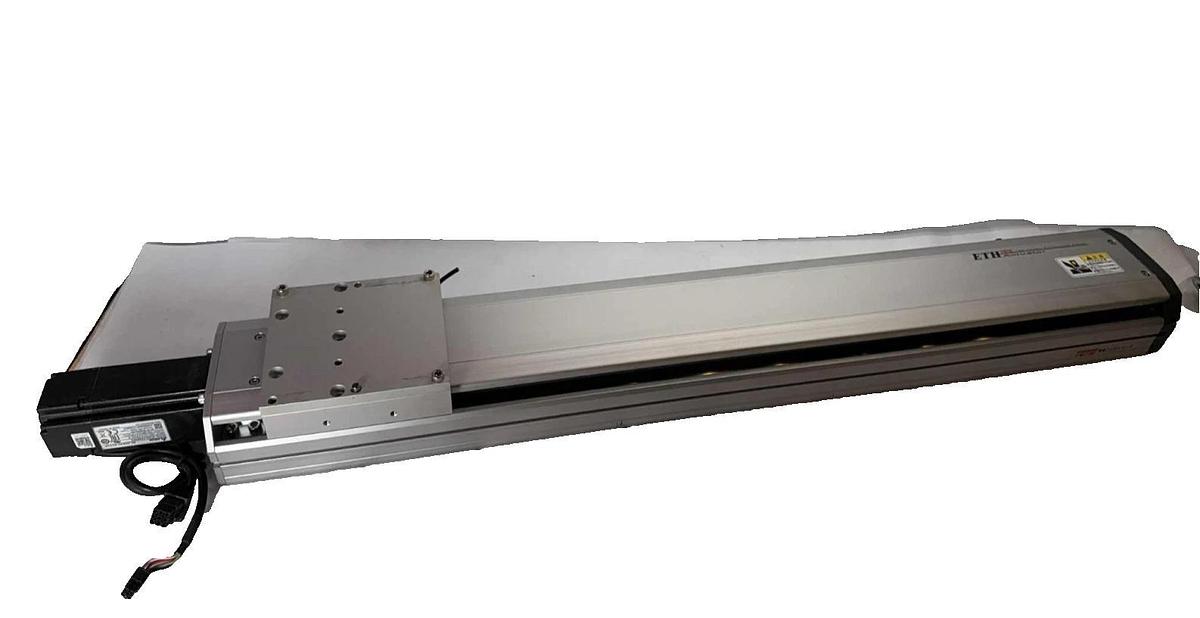 Used TOYO ETH Linear Actuator ETH14-L20-650-BC-T40-C4 ETH14 w/ Servo Motor 110v