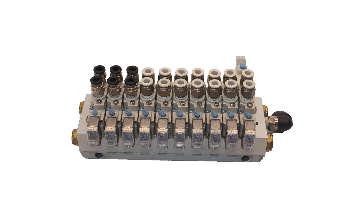 Used SMC Valve Block Assembly with (9) SY5120-5LZE-01 & (1) SY5320-5LZE-01 Valves
