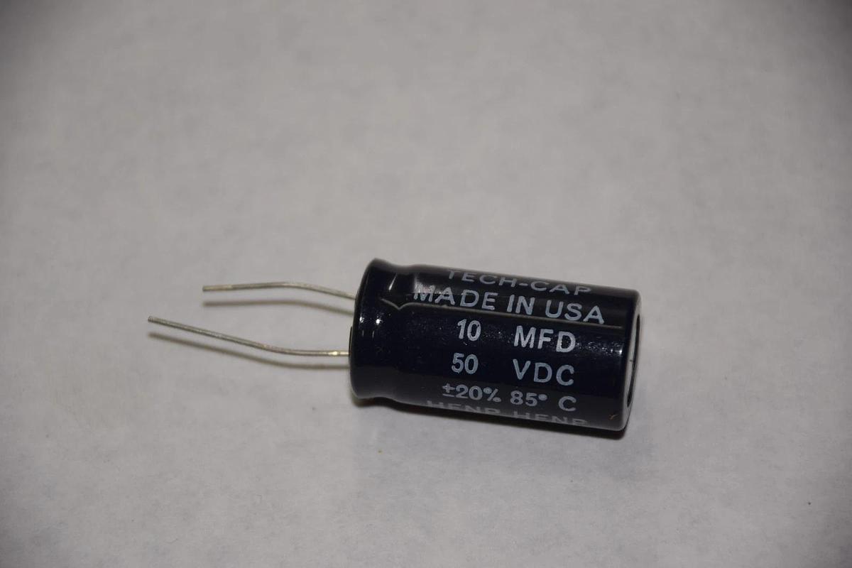 TECH-CAP 10 MFD 50 VDC +/-20% 85 DEGREE CELSIUS HFNP CAPACITOR NEW