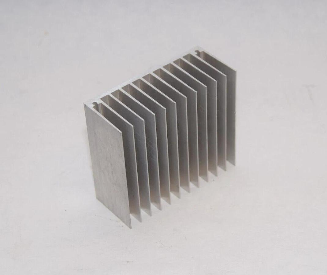 Used Small Heat Sink Approx. 3-5/16" x 2-15/16" x 1-3/8"