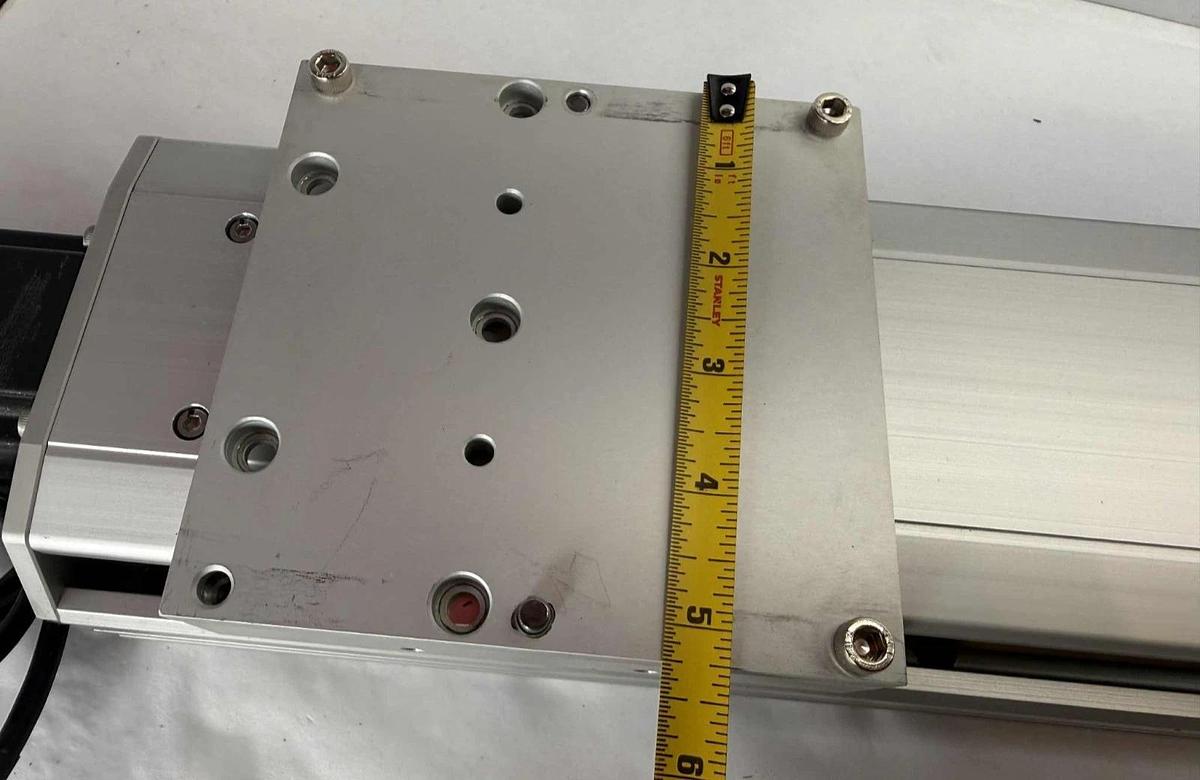 Used TOYO ETH Linear Actuator ETH14-L20-650-BC-T40-C4 ETH14 w/ Servo Motor 110v