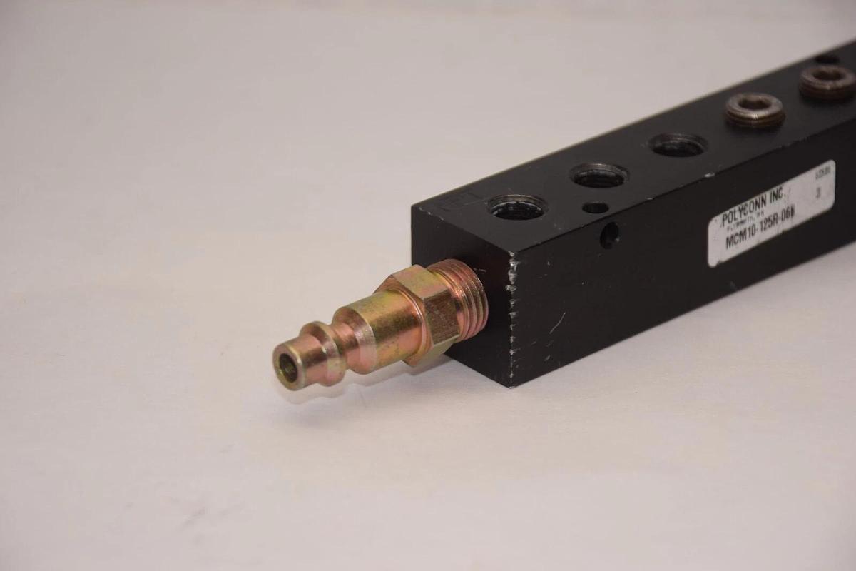 Used POLYCONN INC. MCM10-125R-06B 12-Port Manifold