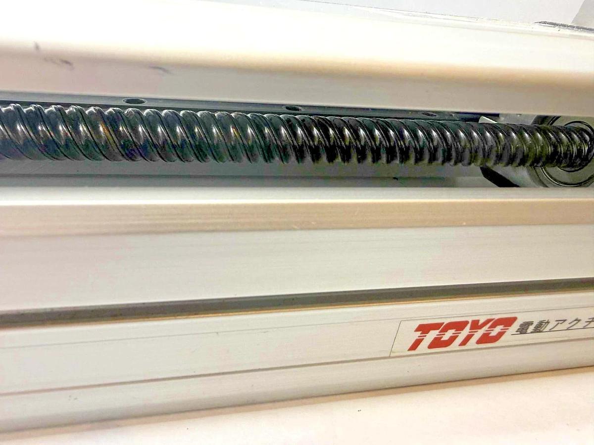 Used TOYO ETH Linear Actuator ETH14-L20-650-BC-T40-C4 ETH14 w/ Servo Motor 110v