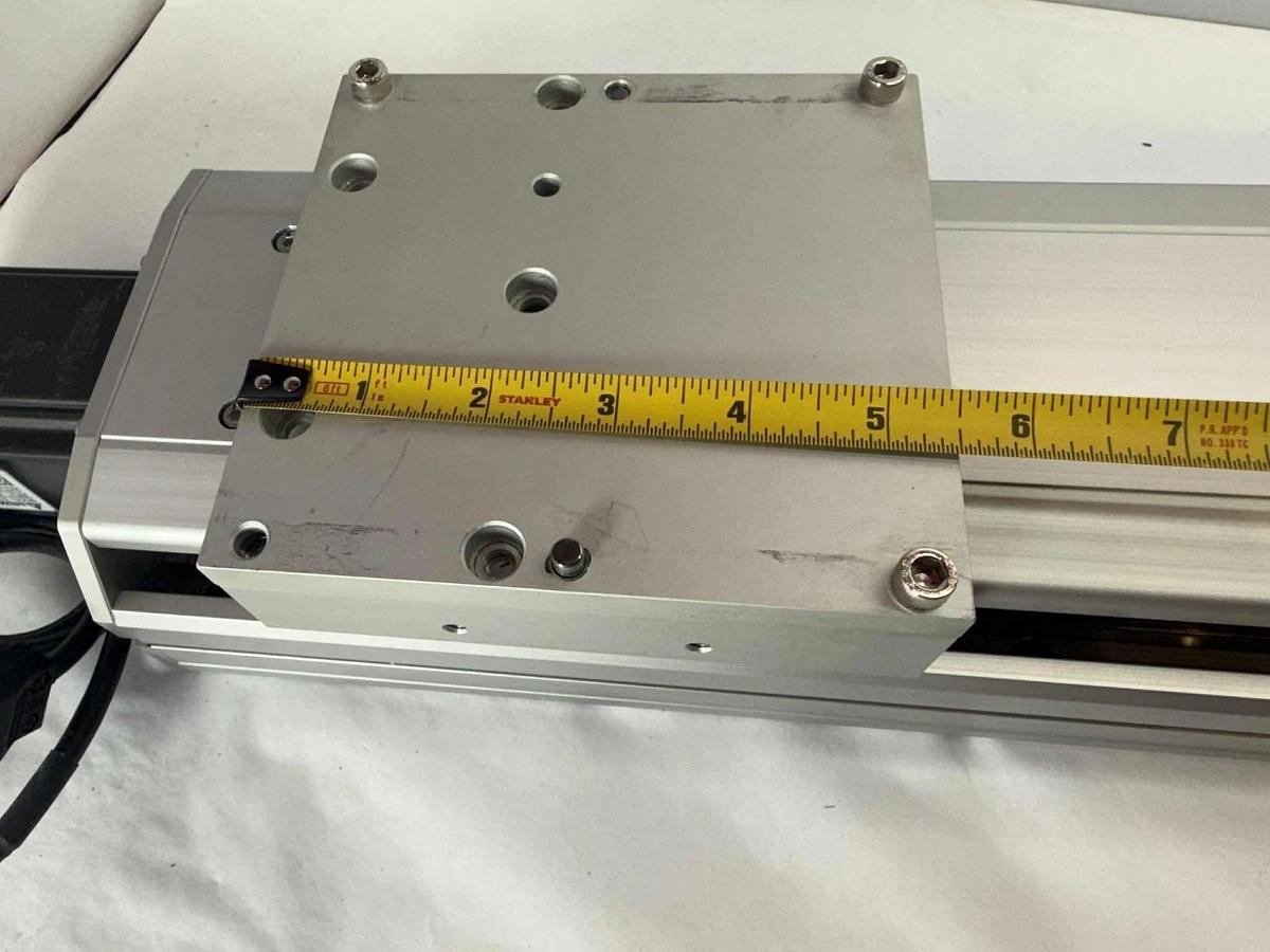 Used TOYO ETH Linear Actuator ETH14-L20-650-BC-T40-C4 ETH14 w/ Servo Motor 110v