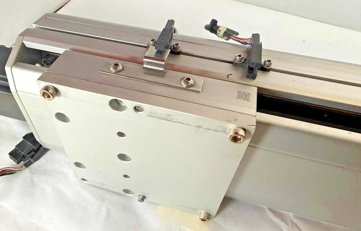 Used TOYO ETH Linear Actuator ETH14-L20-650-BC-T40-C4 ETH14 w/ Servo Motor 110v