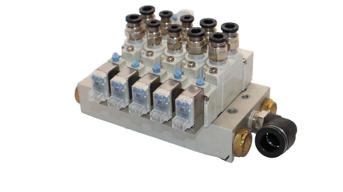 Used SMC Valve Block with (1) SY5420-5LZE-01 , (4) SY5120-5LZE-01 Solenoid Valve