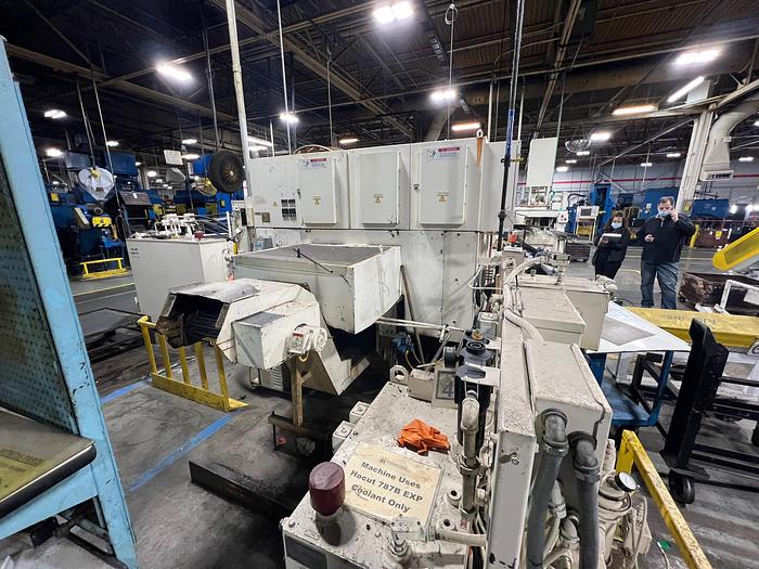 Used OKUMA & HOWE 2SP-25H TWIN SPINDLE TWIN TURRET CNC LATHE