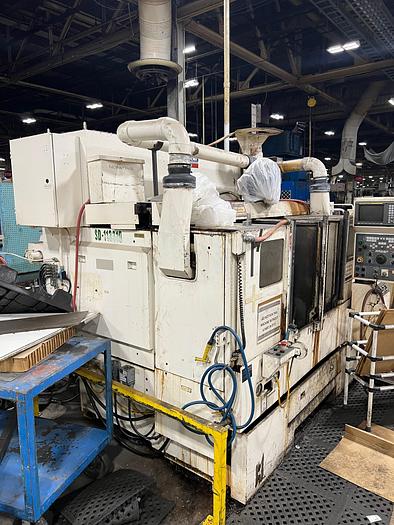 Used OKUMA & HOWE 2SP-25H TWIN SPINDLE TWIN TURRET CNC LATHE