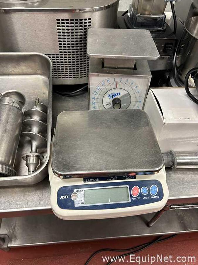 Used Stainless Steel Table with Lot of Miscellaneous Kitchen Equipment