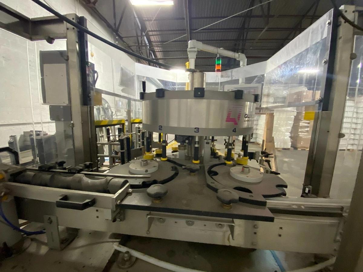 Used Quadrel Labeling System Rotary Labeler
