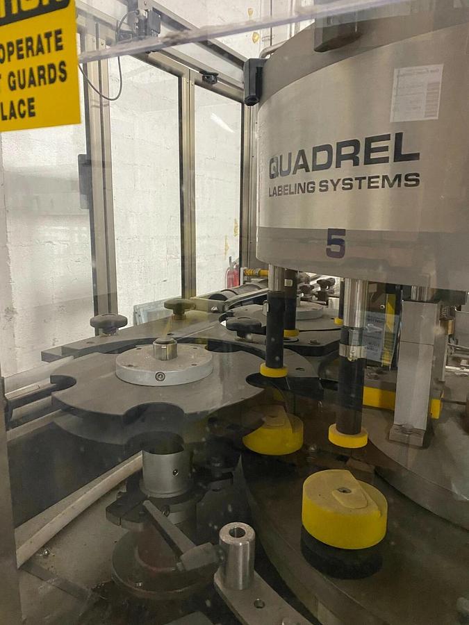 Used Quadrel Labeling System Rotary Labeler