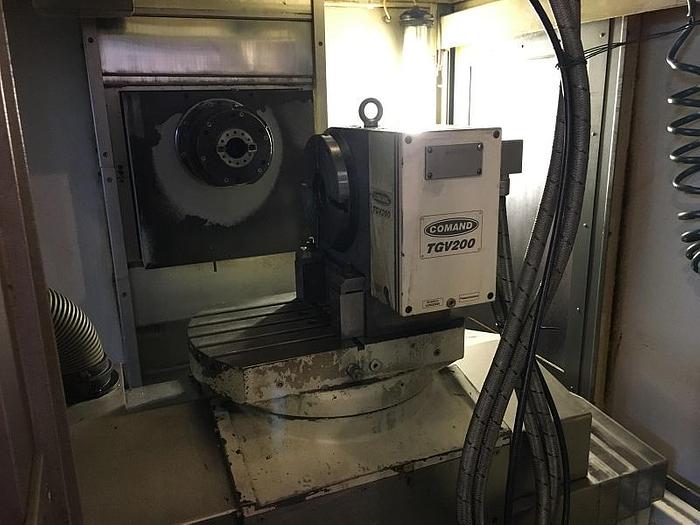 Usato CENTRO DI LAVORO 5 ASSI CNC FANUC 0i – MB ANNO 2004