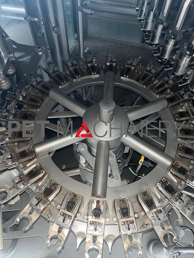 Usado 2008 Krones Volumetic Llenadora/taponadora de PET de 72 válvulas