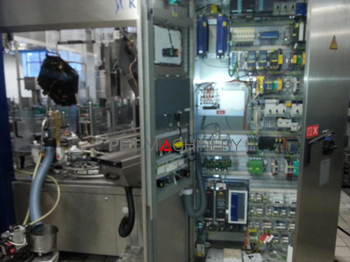 Usado 2010 Krones Starmatic 960/16 Etiquetadora de botellas de vidrio con cola fría