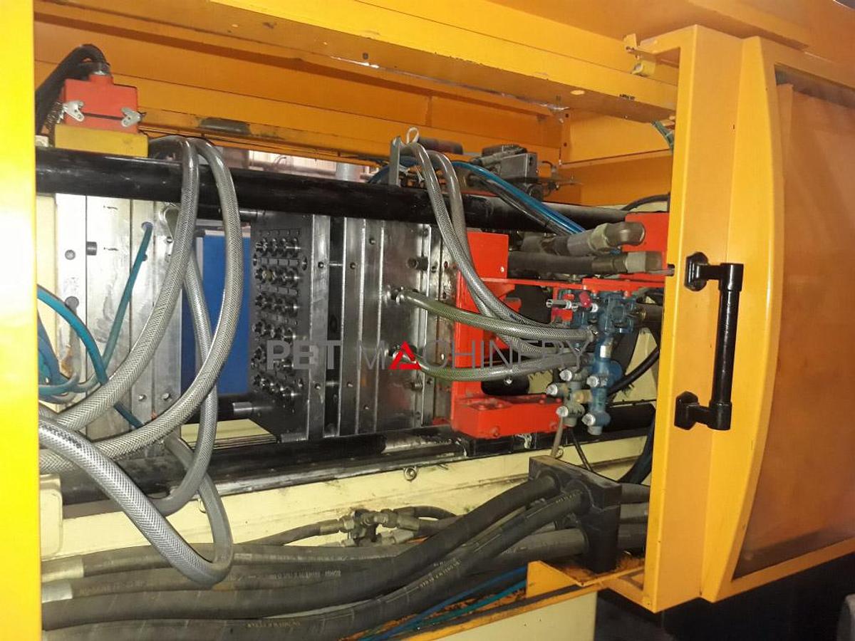 Usado 2010 Husky HyCap 90 PCO1810 Sistema de moldeo por inyección de cierres