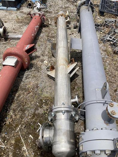 Used Used Louisville Exchanger and Vessel Inc. vertical approximately 70 square foot 304L stainless steel shell and tube Heat Exchanger