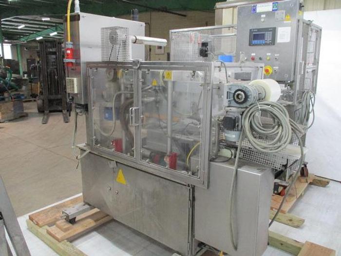 Used Mondini Cup Filling & Sealing Line for Solids ans Liquids